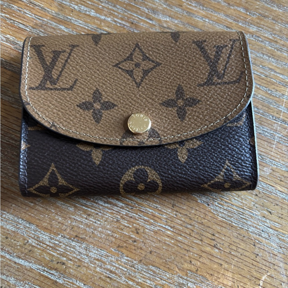 Louis Vuitton Brown Monogram Wallet gently used perfect condition comes with bag